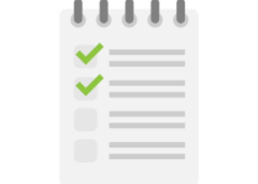 a notepad with check marks